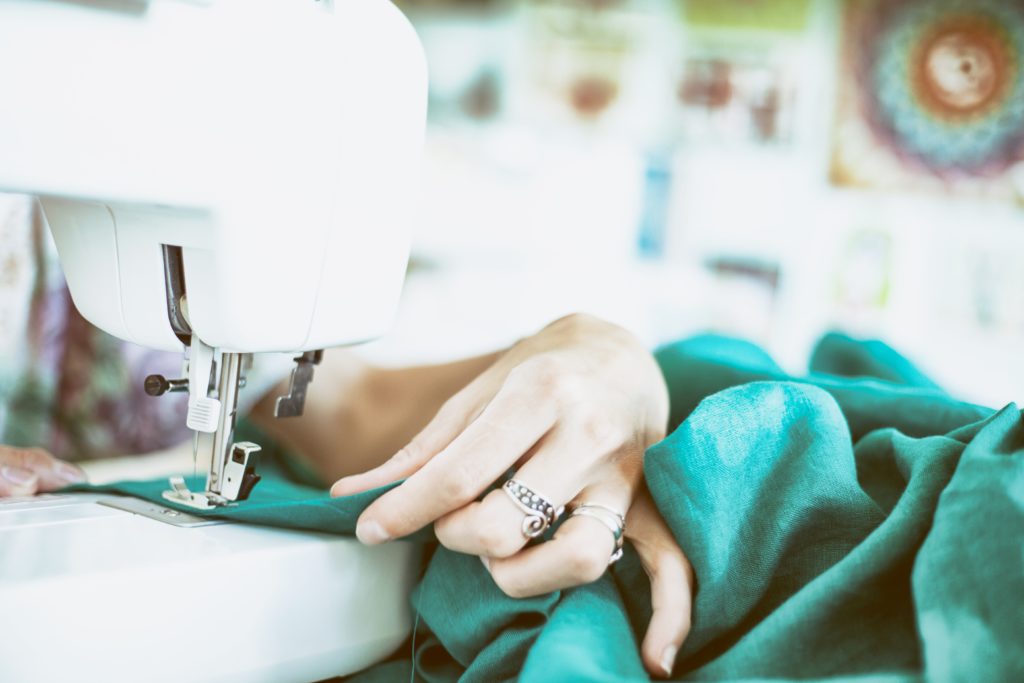 Housewife Sewing Cloths at home