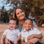 two boys on mothers lap positive parenting tips