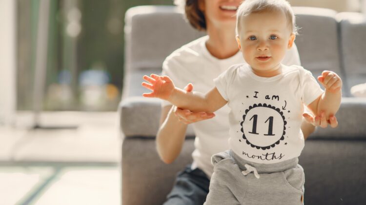 Mommy helping a 11 month old walk